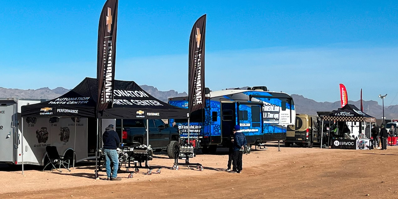 Off-Roading Tents and RV Parked in the Desert