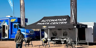 Members of Team Standing Around or Near AutoNation Parts Center