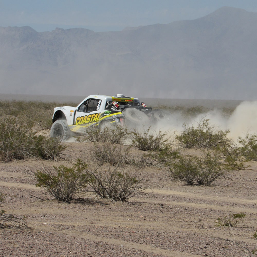 White Chevy Truck Off-Roading in the Desert