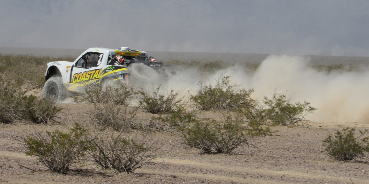 White Chevy Truck Off-Roading in the Desert