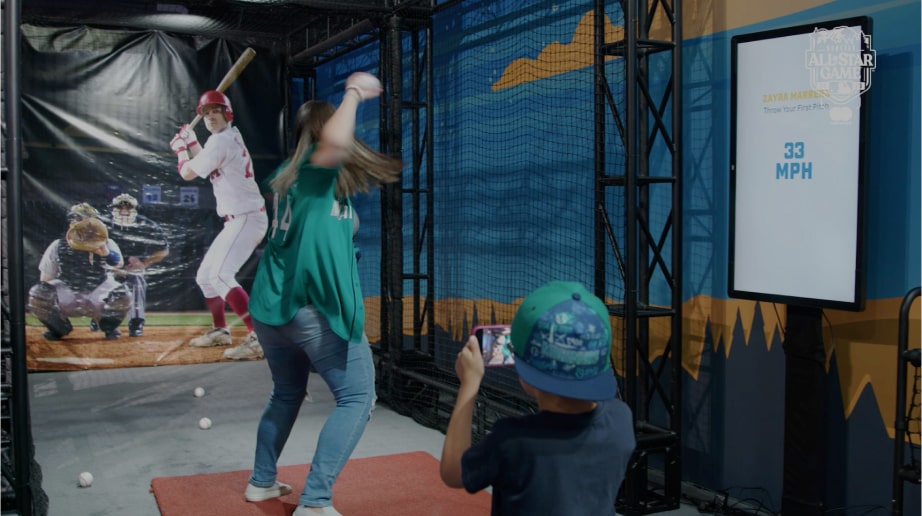 Woman throwing baseball pitch