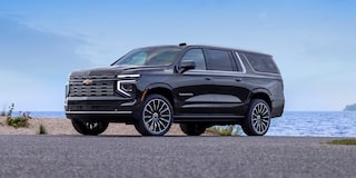 Front Three-quarters View of the 2026 Chevy Suburban Parked Near the Lake