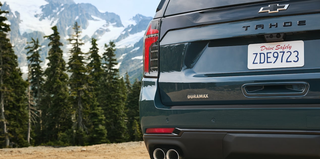 Close-up of the Rear End of the 2026 Chevy Tahoe Parked in the Woods