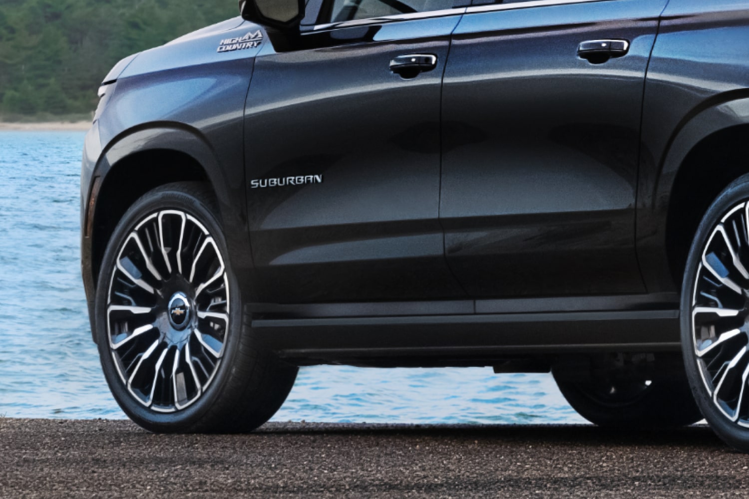 Wheels on a Suburban High Country shown in Dark Ash Metallic