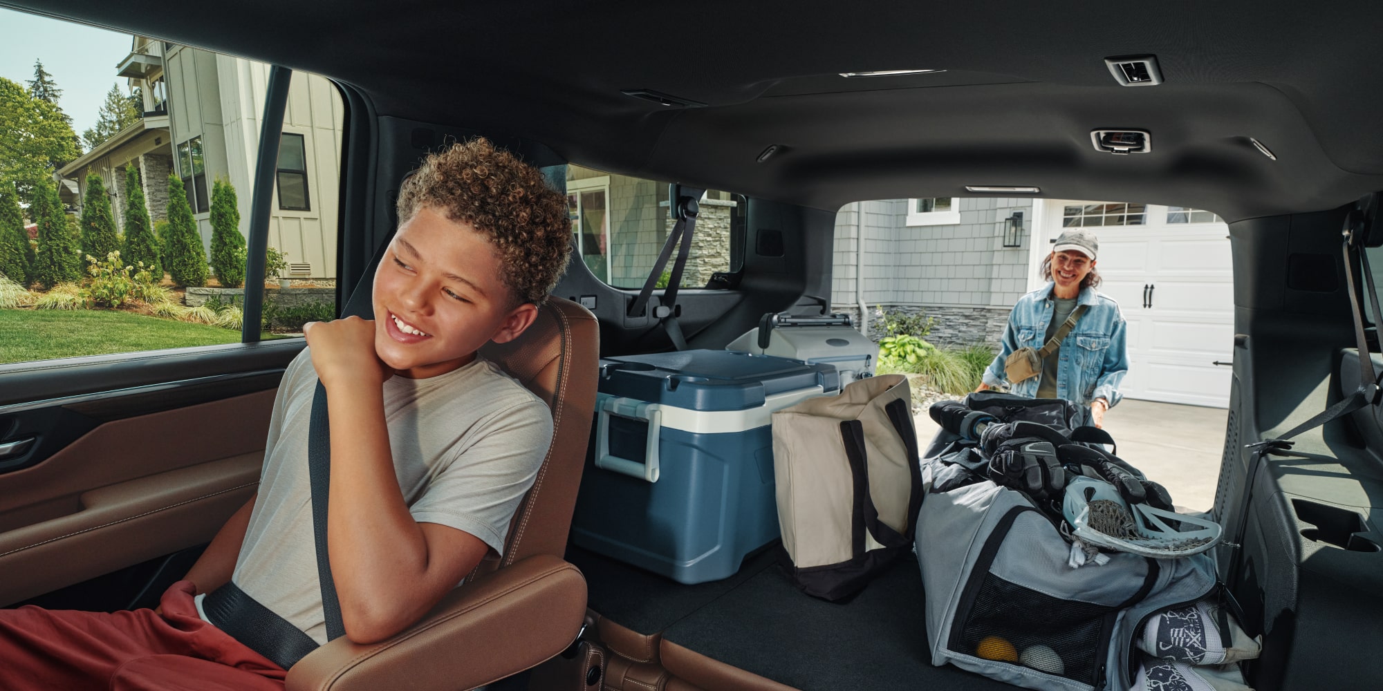 Suburban High Country shown in Jet Back/Mocha interior
