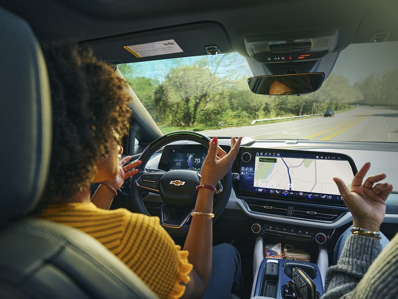 A Promotional Graphic Highlighting Available Super Cruise in the 2027 Chevy Traverse.