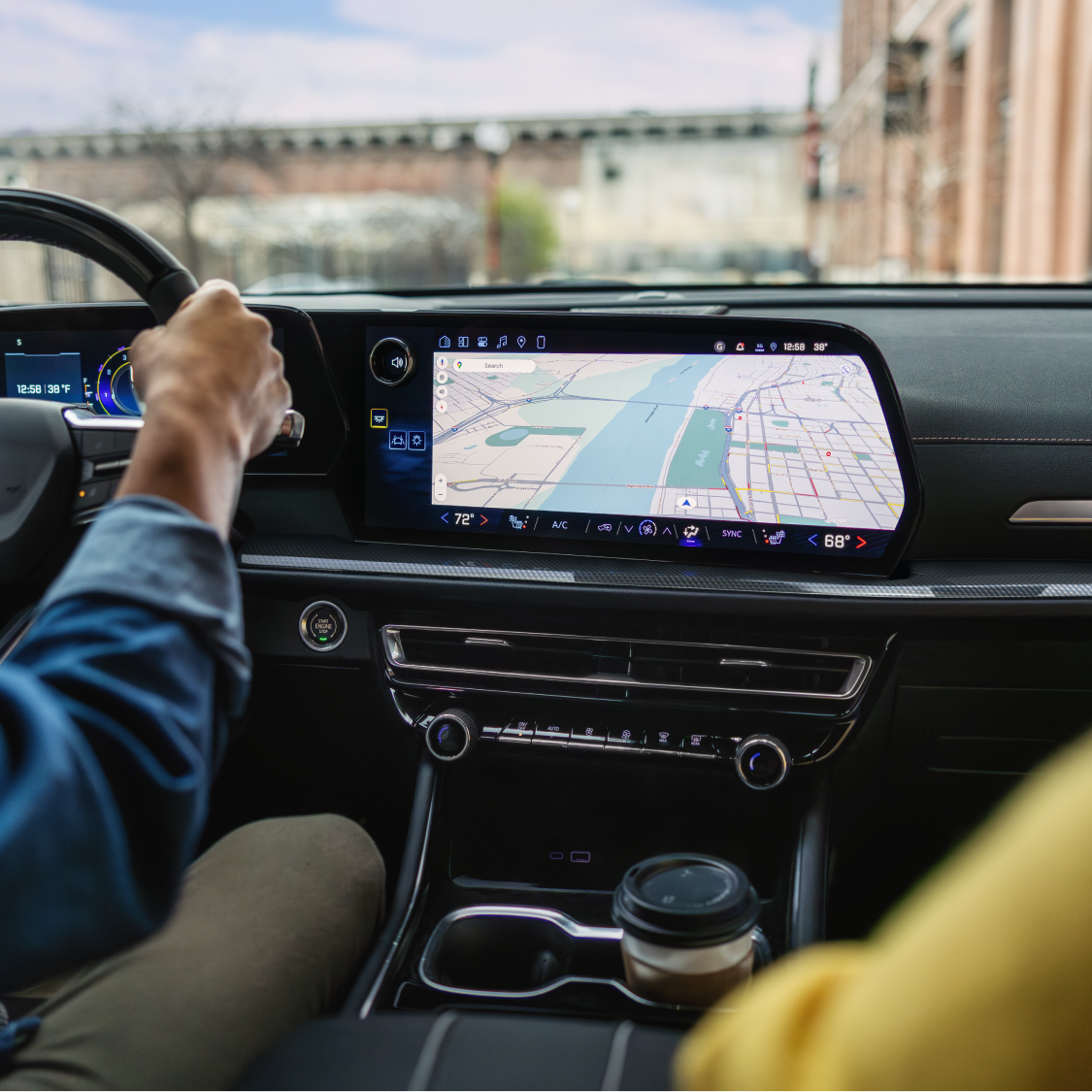The Interior of a 2027 Chevy Traverse Featuring a Large Infotainment Touchscreen and Driver Display.