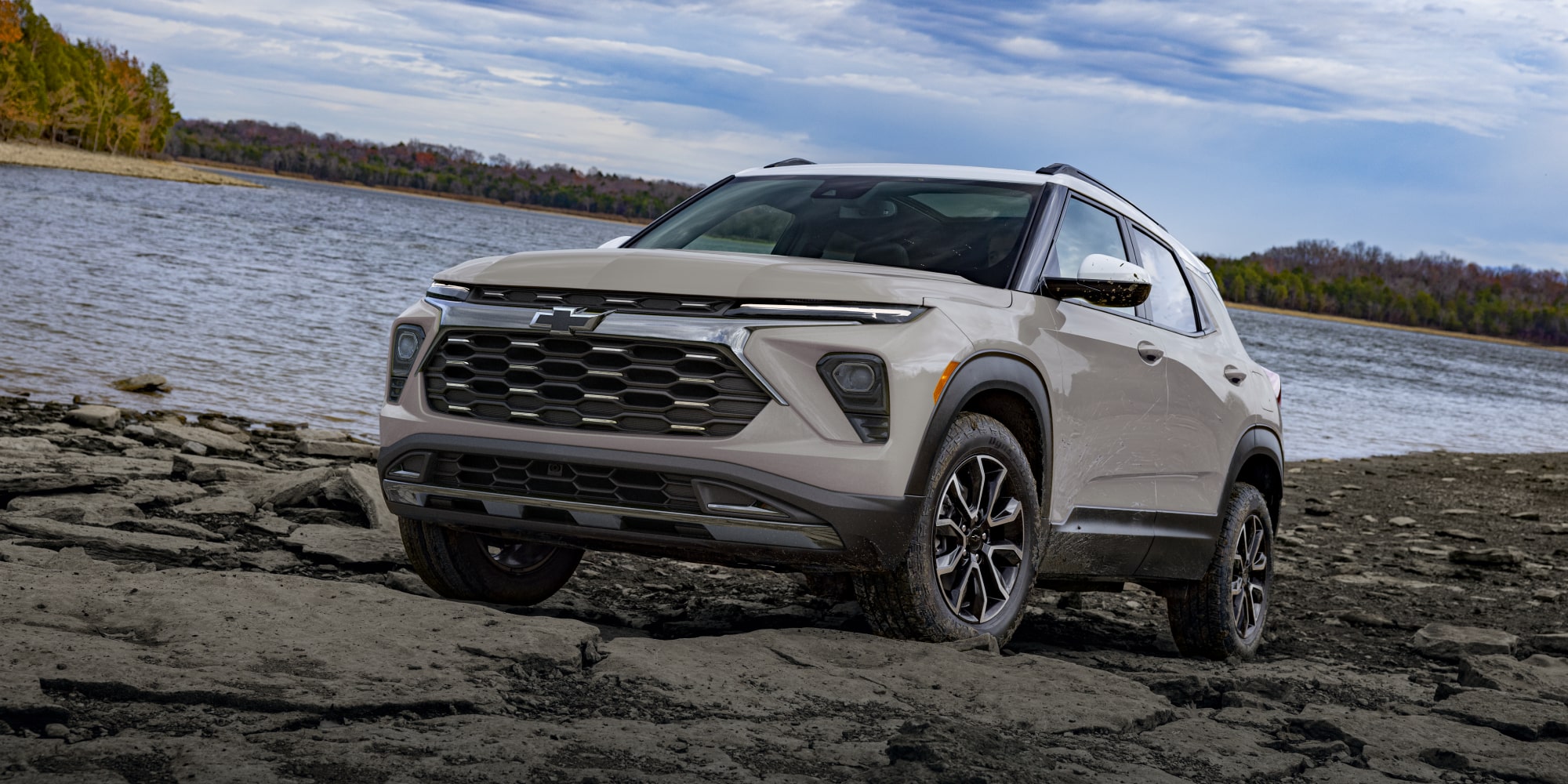 The Chevy Trailblazer Off-roading and Parked on a Rocky Terrain by a Lake