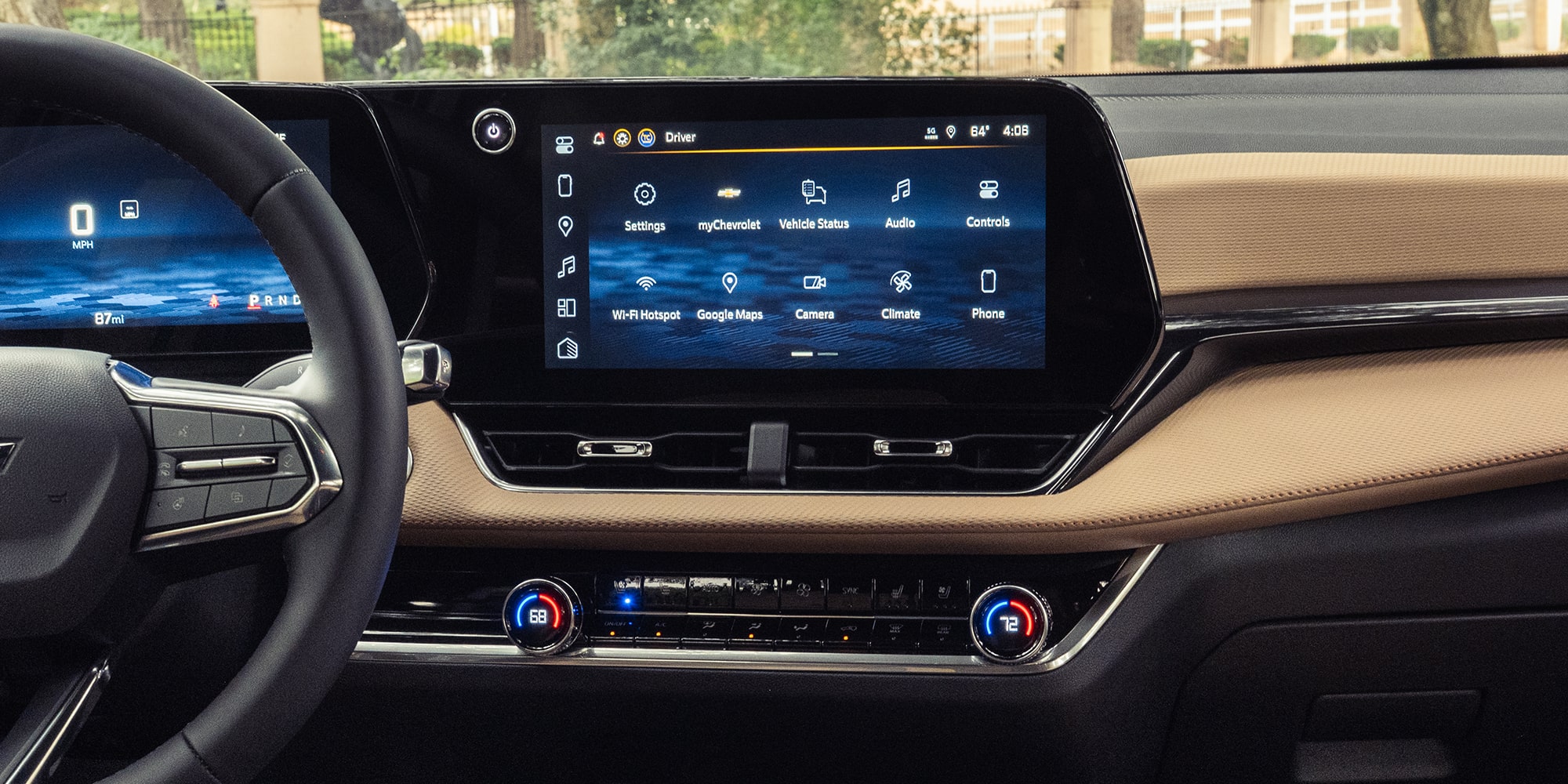 The Dashboard of a Chevrolet Equinox Featuring a Large Central Touchscreen Displaying Navigation and Connectivity Controls Above a Sleek Brown and Black Trim.