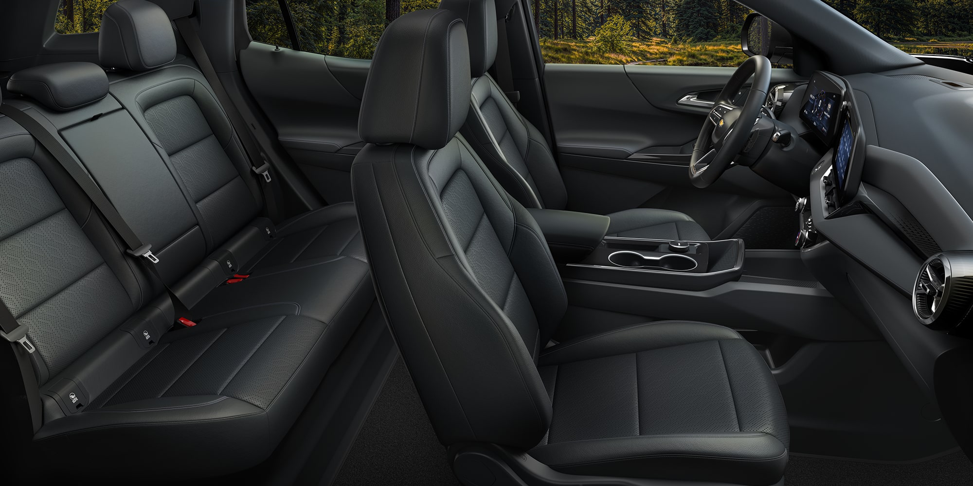 The Interior of a Chevrolet Equinox Featuring Two-Tone Beige and Black Seats With ACTIV Branding on the Headrests.