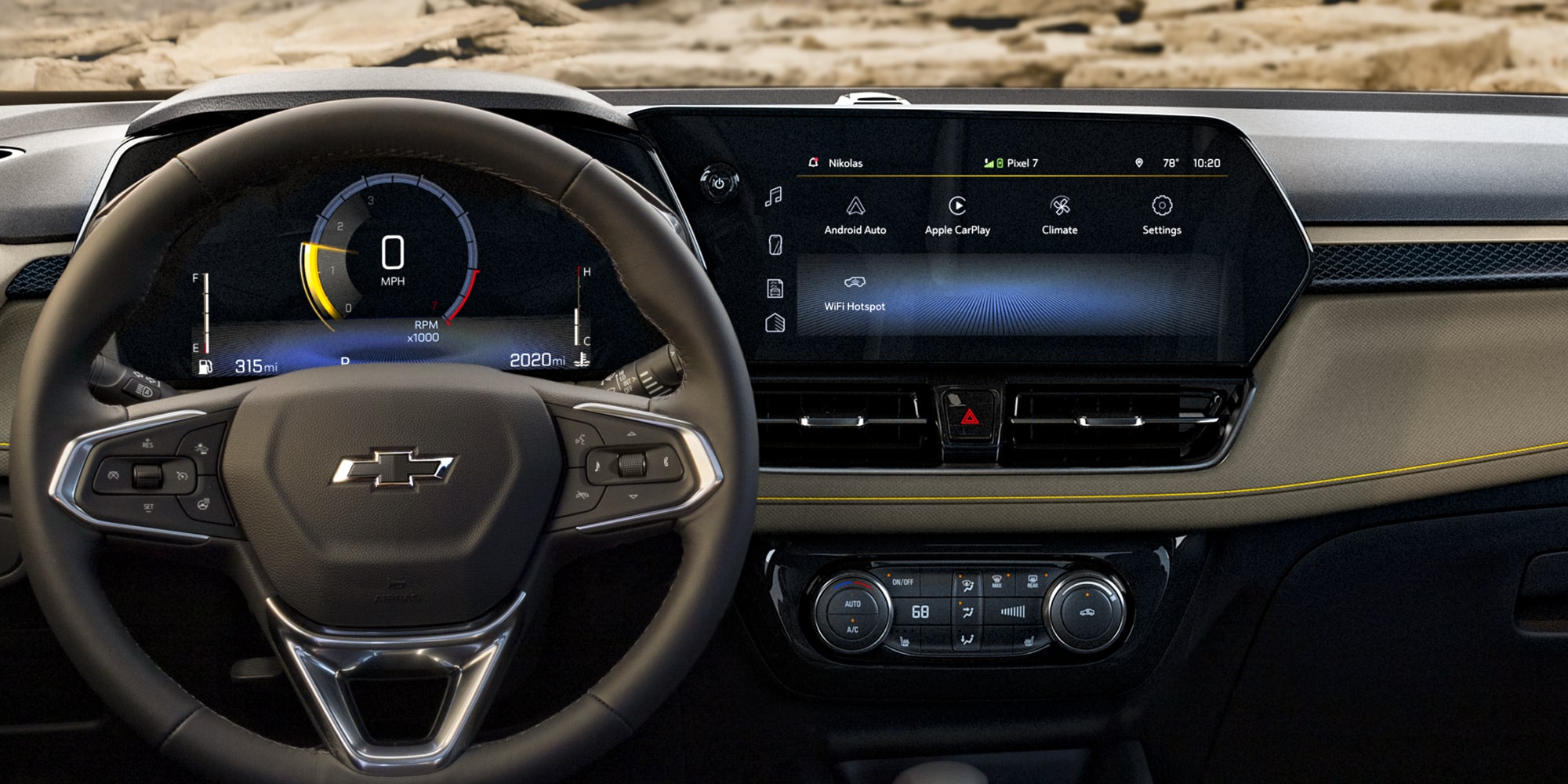 El interior de una Chevrolet Trailblazer que muestra el volante, la pantalla digital del conductor y un sistema de infoentretenimiento con una pantalla táctil amplia.
