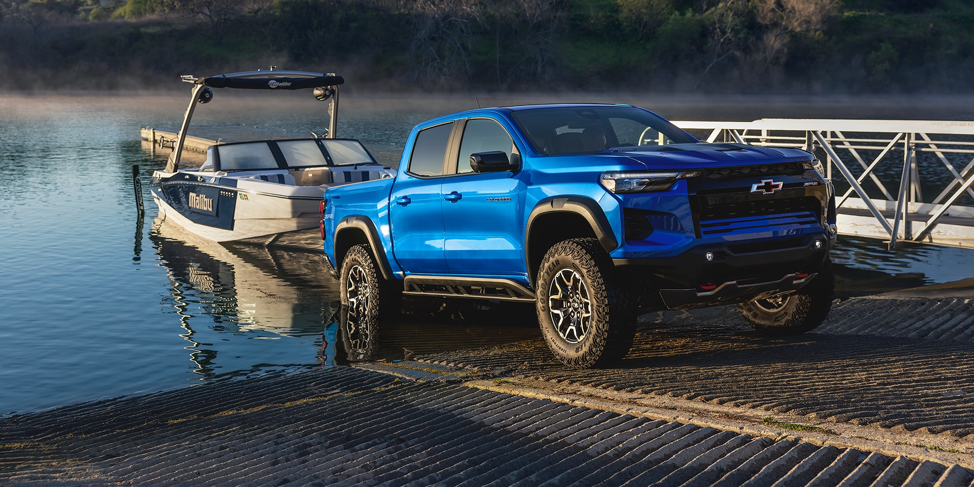 2026 Blue Chevy Colorado towing a boat