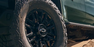 ZR2 specific 18-inch Black painted wheels with 35-inch Goodyear Territory MT tires.