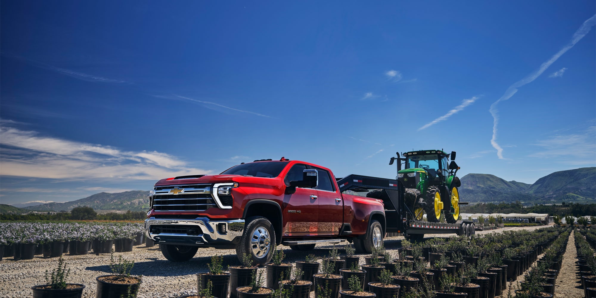 Silverado 2500 HD LTZ in Red Hot with available features shown.