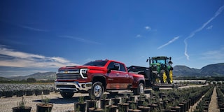 Silverado 2500 HD LTZ in Red Hot with available features shown.