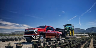 Silverado 2500 HD LTZ in Red Hot with available features shown.