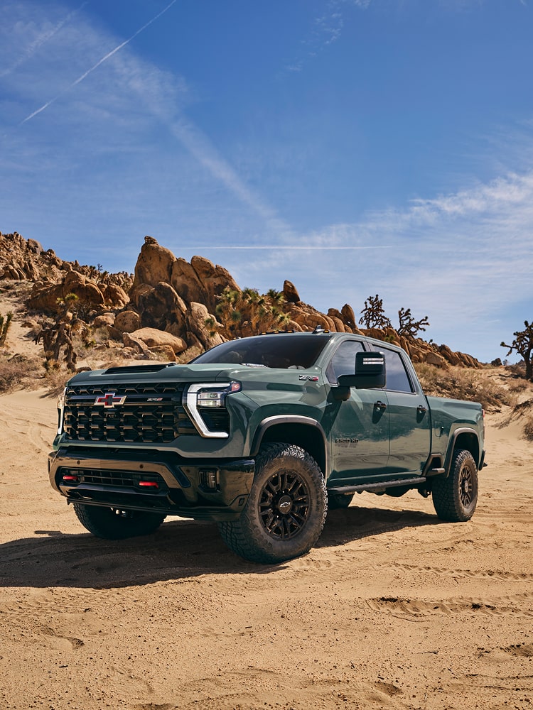 A 2026 Chevy Silverado HD Driving Off-Road in the Desert
