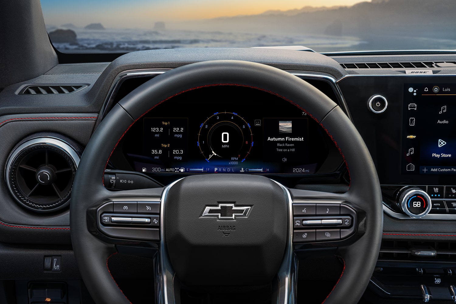 Interior of a Chevy Colorado Showing the Steering Wheel and Dashboard Controls.