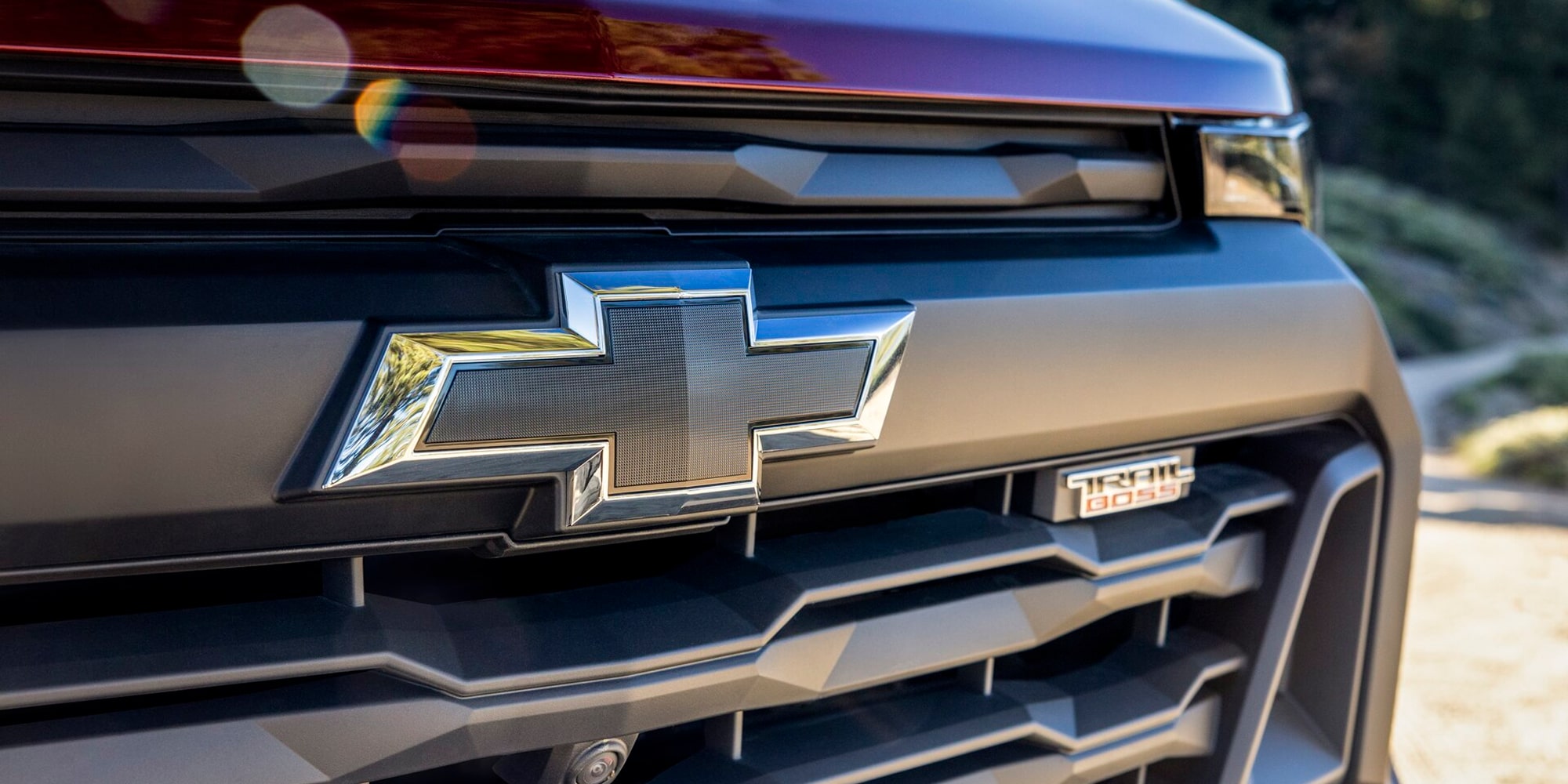 A Close-Up View of the Chevy Bowtie Emblem Displayed on the Front Grille of a Chevy Colorado.
