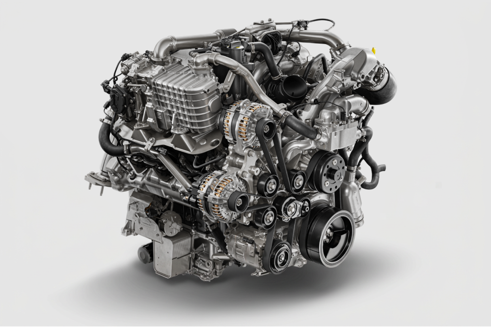 A Chevy Silverado HD Engine Displayed on a White Background Showing Intricate Mechanical Components and Metallic Engine Details