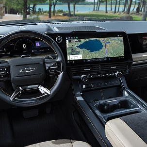 Interior View of the Chevrolet Silverado High Country Featuring a Premium Leather Cabin, Digital Driver Display, and Center Touchscreen Infotainment System.