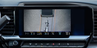 The Rearview Camera Display Inside a Chevy Silverado LD Showing a Hitch View for Trailer Alignment on the Dashboard Screen.