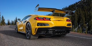 Low Rear View of a Yellow Chevy Corvette ZR1 Driving Down the Road