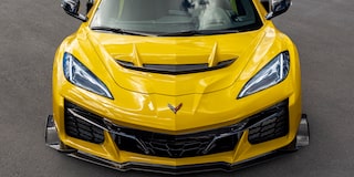 Front View of a Yellow Chevy Corvette ZR1 Stationed on a Road