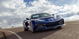 Low Angle Three Quarter View of a Blue Chevy Corvette ZR1 Going down the Road on a Sunny Day