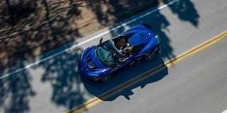 Birds Eye View of a Blue Chevy Corvette ZR1 Driving Down the Road