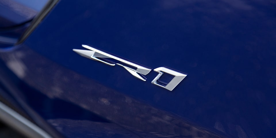 Close-up of the ZR1 Emblem on a Blue Chevy Corvette