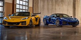 Two Blue and Yellow Chevy Corvette ZR1 Stationed in a Show Room