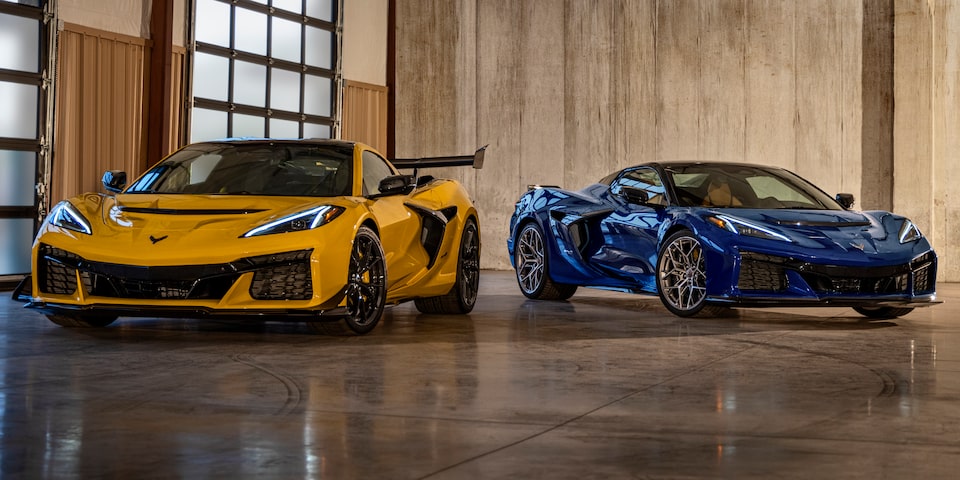 Two Blue and Yellow Chevy Corvette ZR1 Stationed in a Show Room