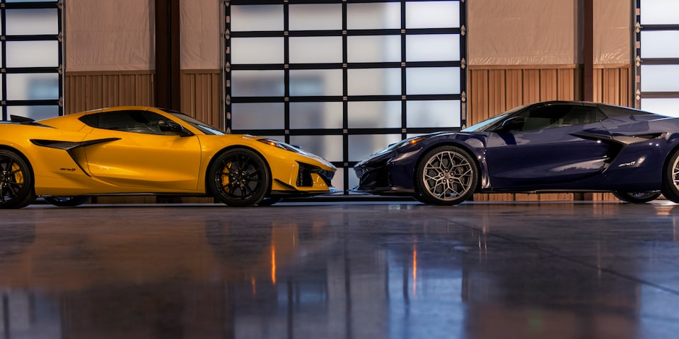 Side View of Two Blue and Yellow Chevy Corvette ZR1 Facing Each Other in a Showroom