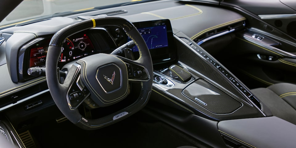 Front Interior View of a Chevy Corvette ZR1 with Steering wheel and Display Panel Visible