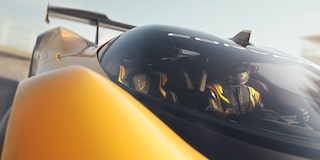 View of a Driver in a Yellow and Black 2026 Corvette CX.R