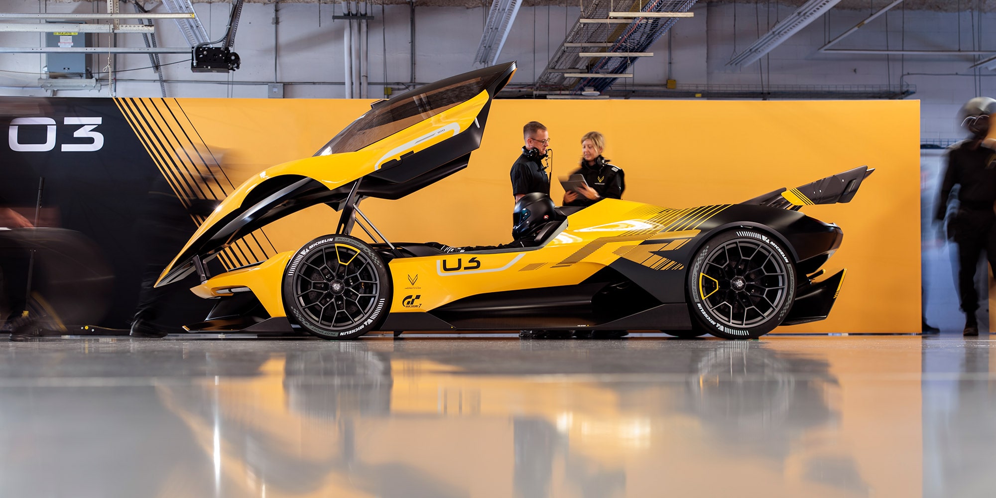 Driver side view of a 2026 Corvette CX.R with the canopy open