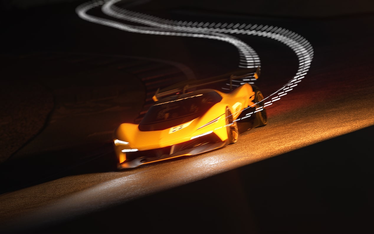 View of the 2026 Corvette CX.R Racing Down a Track at Night