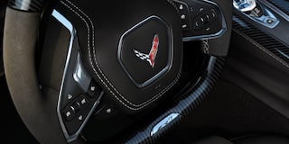 Close-Up of the Logo in the Center of the Steering Wheel Inside the 2026 Corvette
