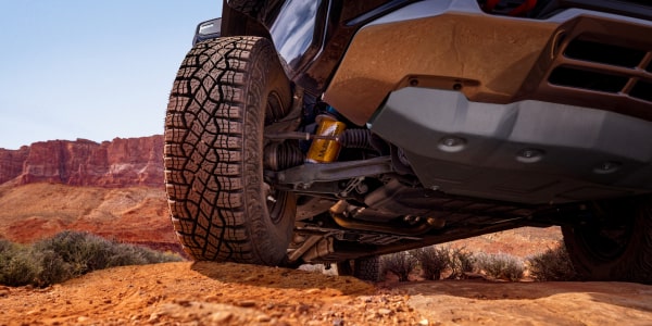 Three-quarters View of a 2027 Chevy Silverado 1500 Parked in an Open Desert