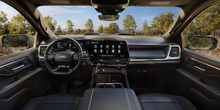 Close-up of the Display Dashboard with the Driver Selecting a Program in a 2026 Chevy Colorado
