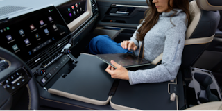 Close-up of the Display Dashboard with the Driver Selecting a Program in a 2026 Chevy Colorado