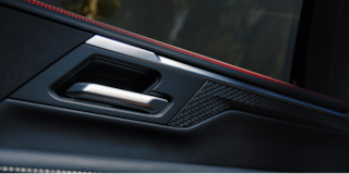 Close-up of the Display Dashboard with the Driver Selecting a Program in a 2026 Chevy Colorado