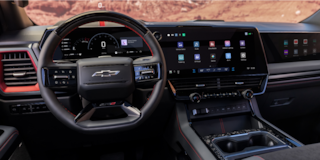 Close-up of the Display Dashboard with the Driver Selecting a Program in a 2026 Chevy Colorado