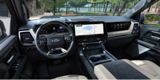 Close-up of the Display Dashboard with the Driver Selecting a Program in a 2026 Chevy Colorado