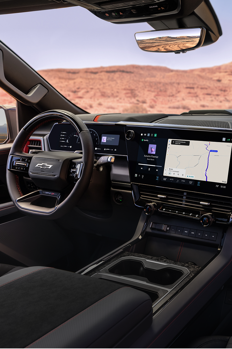 The 2027 Chevrolet Silverado 1500 Front Row Interior and Dashboard with Text Overlay Reading "Modern Looks. Major Tech."
