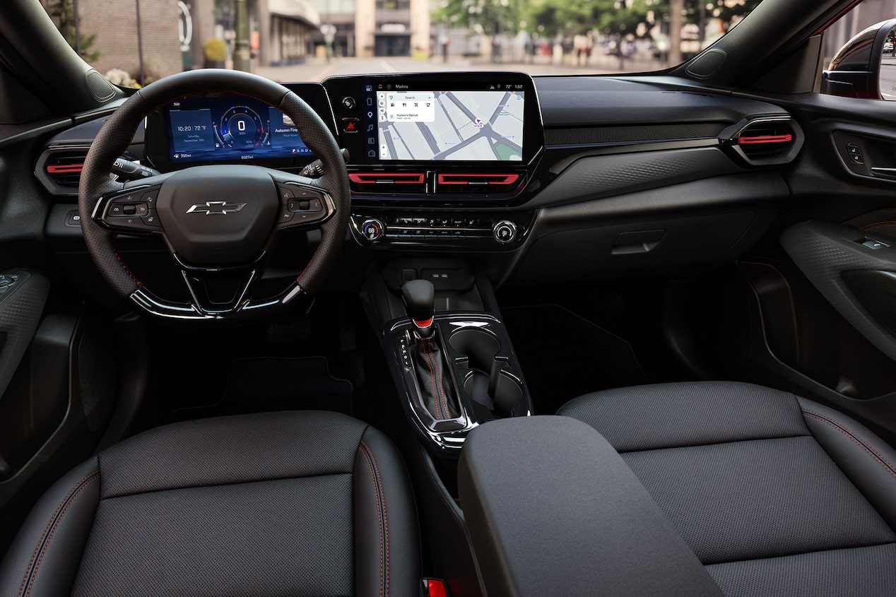 A Spacious View of the Chevy Trax Cabin Showing the Front Seats, Dashboard, Center Console, and Dual Digital Displays.