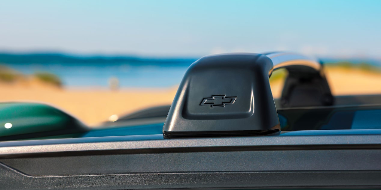A Close-Up of a Chevy Logo Integrated Into the Roof Rail of a Chevy Trax.