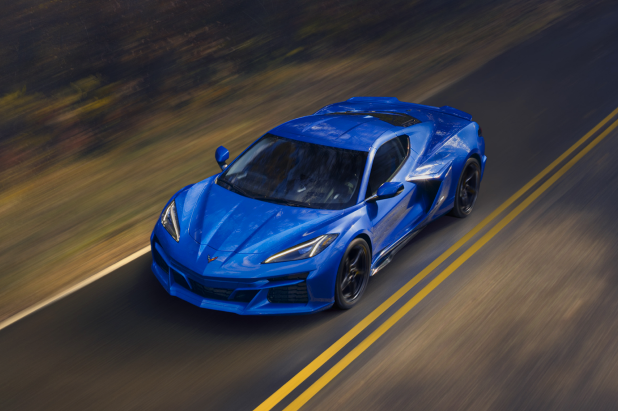 Blue Corvette E-Ray Driving on Street