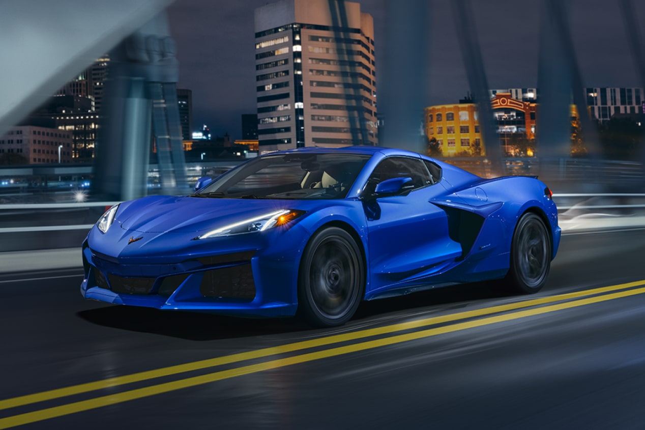 The Blue Corvette E-Ray Driving on a City Street
